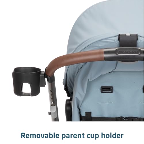 Maxi-Cosi Zelia Luxe 5-in-1 modular travel system with stroller and car seat, featuring adjustable handle and stylish design.