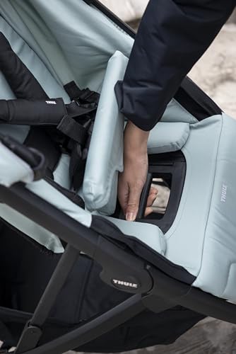 Lightweight Thule Spring 2 single child stroller with ventilated canopy, adjustable handlebar, compact fold, and maneuverable design.