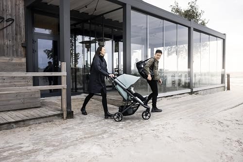 Thule Spring 2 single child stroller with ventilated canopy, adjustable handlebar, lightweight frame, and compact fold for easy transport.