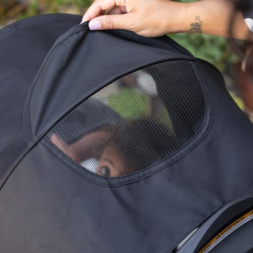 Baby Trend Passport cargo stroller travel system with EZ-Lift infant car seat in pink bamboo, featuring adjustable handle and storage basket.