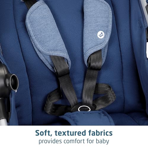 Maxi-Cosi Zelia Luxe 5-in-1 modular travel system with stroller and car seat in navy blue fabric, ready for travel.