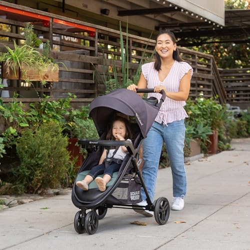 Baby Trend Passport cargo stroller with EZ-Lift Plus infant car seat in pink bamboo, featuring a compact travel system and adjustable handle.