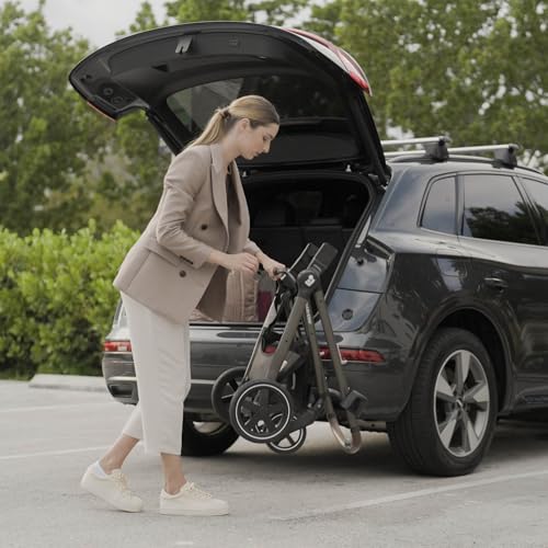 Maxi-Cosi Zelia Luxe 5-in-1 travel system with stroller, car seat, and accessories, designed for versatile family travel.