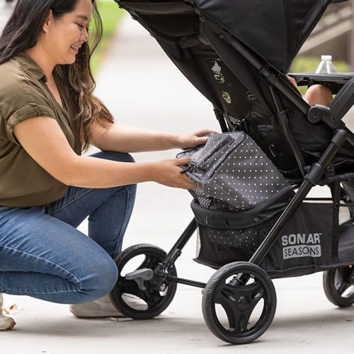 Baby Trend Passport cargo stroller with pink bamboo fabric, EZ-Lift infant car seat attached, suitable for travel and everyday use.