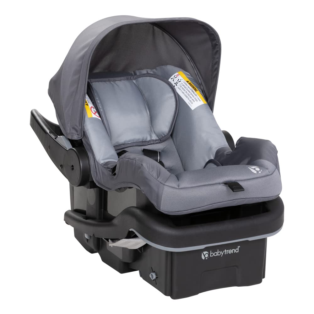 Baby Trend Passport cargo stroller with pink bamboo fabric and EZ-Lift infant car seat, showcasing a compact travel system for babies.