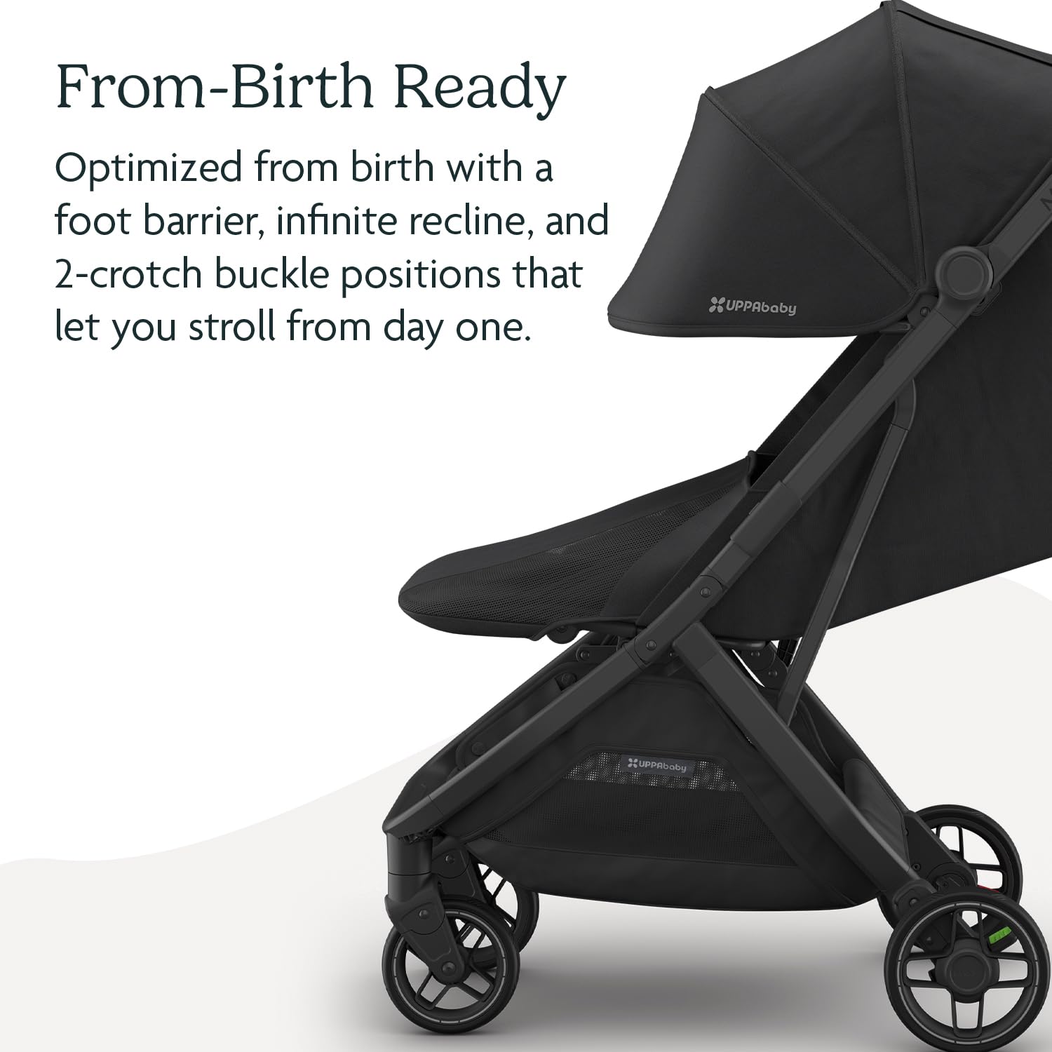 UPPAbaby Minu V3 travel stroller in greyson color with charcoal frame and saddle leather, showing compact folded design and lightweight build.