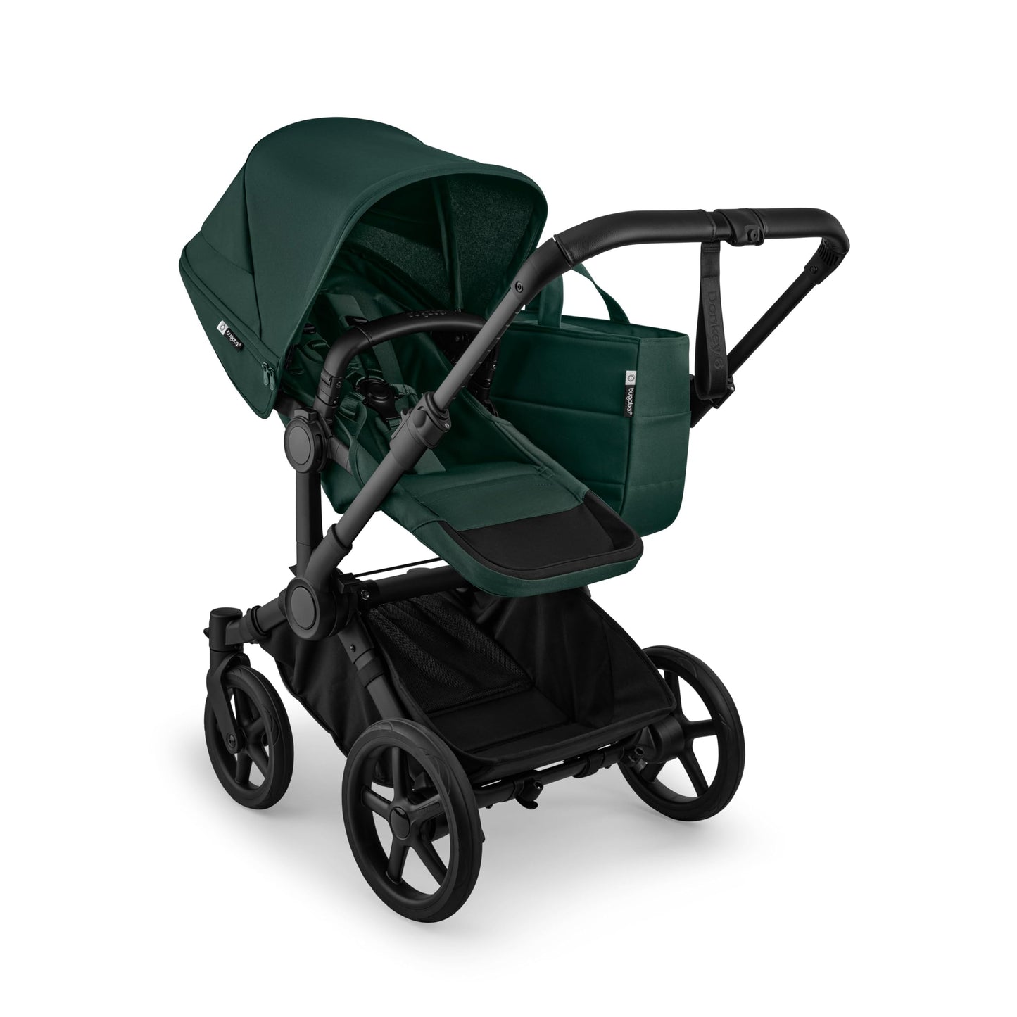 Bugaboo Donkey 6 Cocoa Brown single-to-double all-terrain stroller with toddler and newborn seats, suitable for urban and outdoor use.