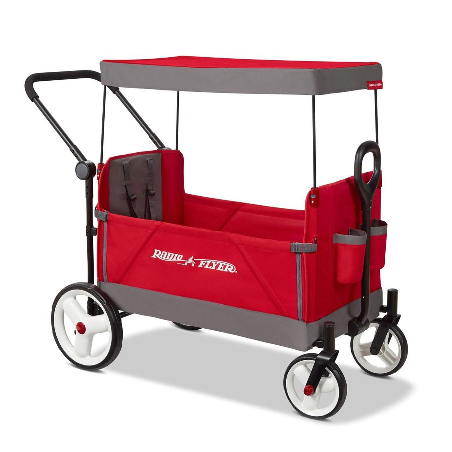 Red Radio Flyer wagon for kids, convertible stroller and rolling beach cart with wheels, suitable for toddlers ages 1 and up.