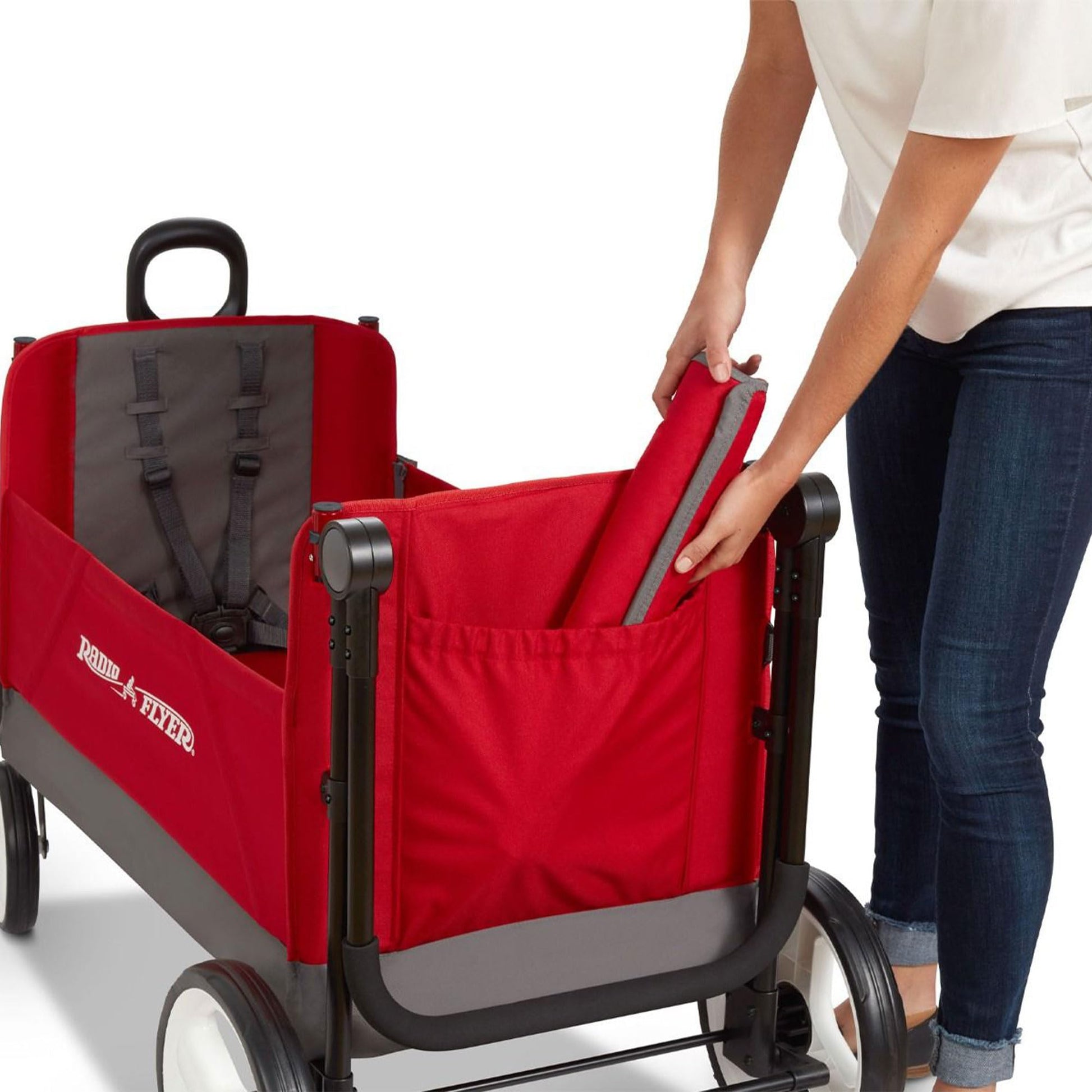 Red Radio Flyer wagon for kids, convertible stroller and rolling cart with wheels, suitable for toddlers 1 to 3 years old.