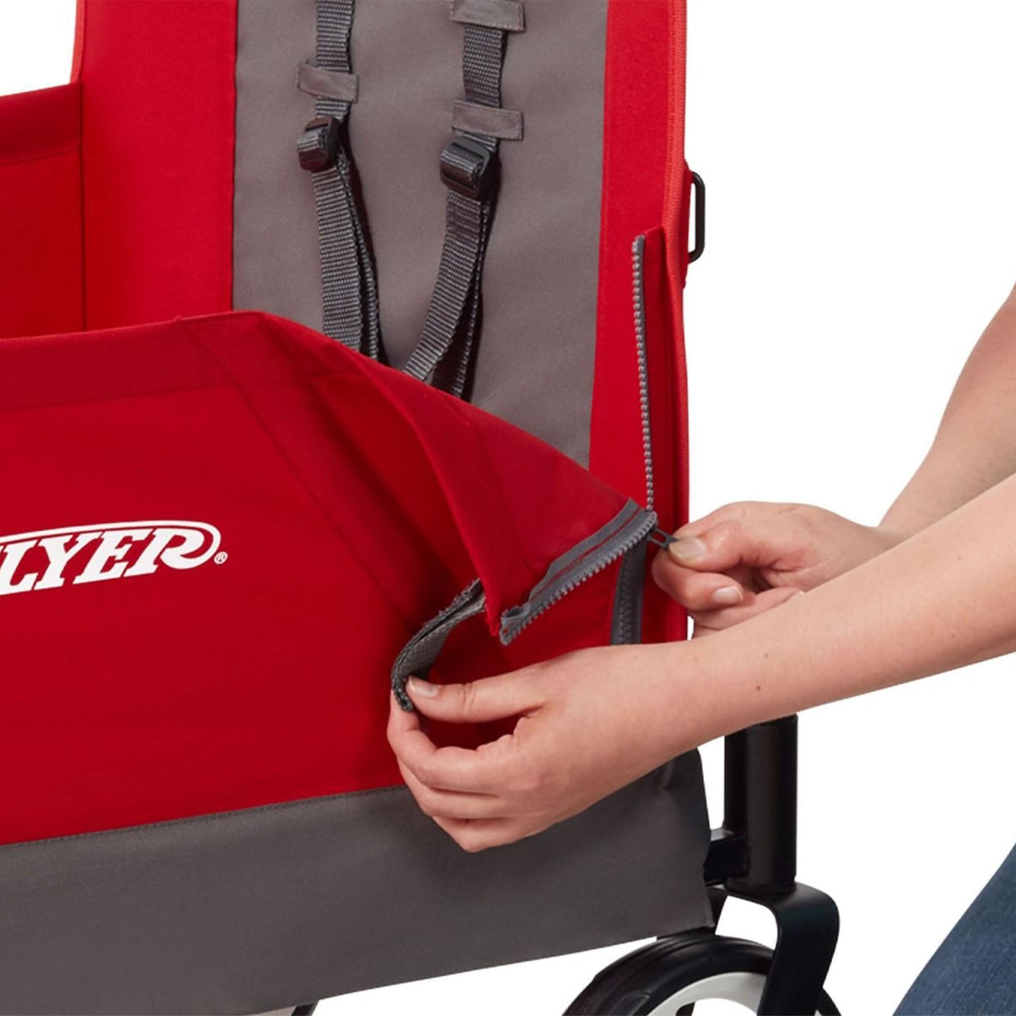 Red Radio Flyer wagon for kids and toddlers, convertible stroller and rolling beach cart with wheels, suitable for ages 1+ years.