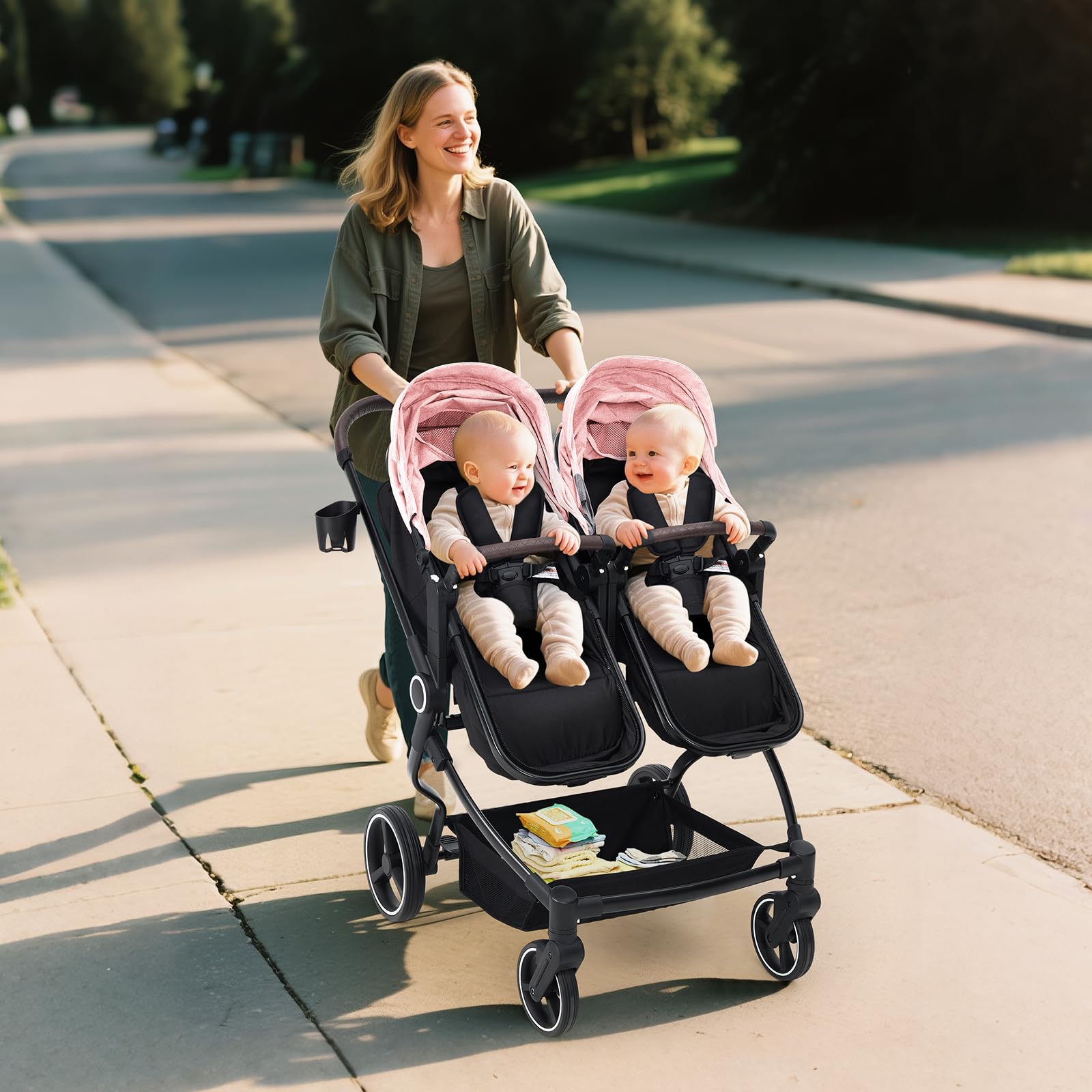 Lightweight double stroller for twins with reclining seats, adjustable canopy, and 5-point harness, designed for infants and toddlers.