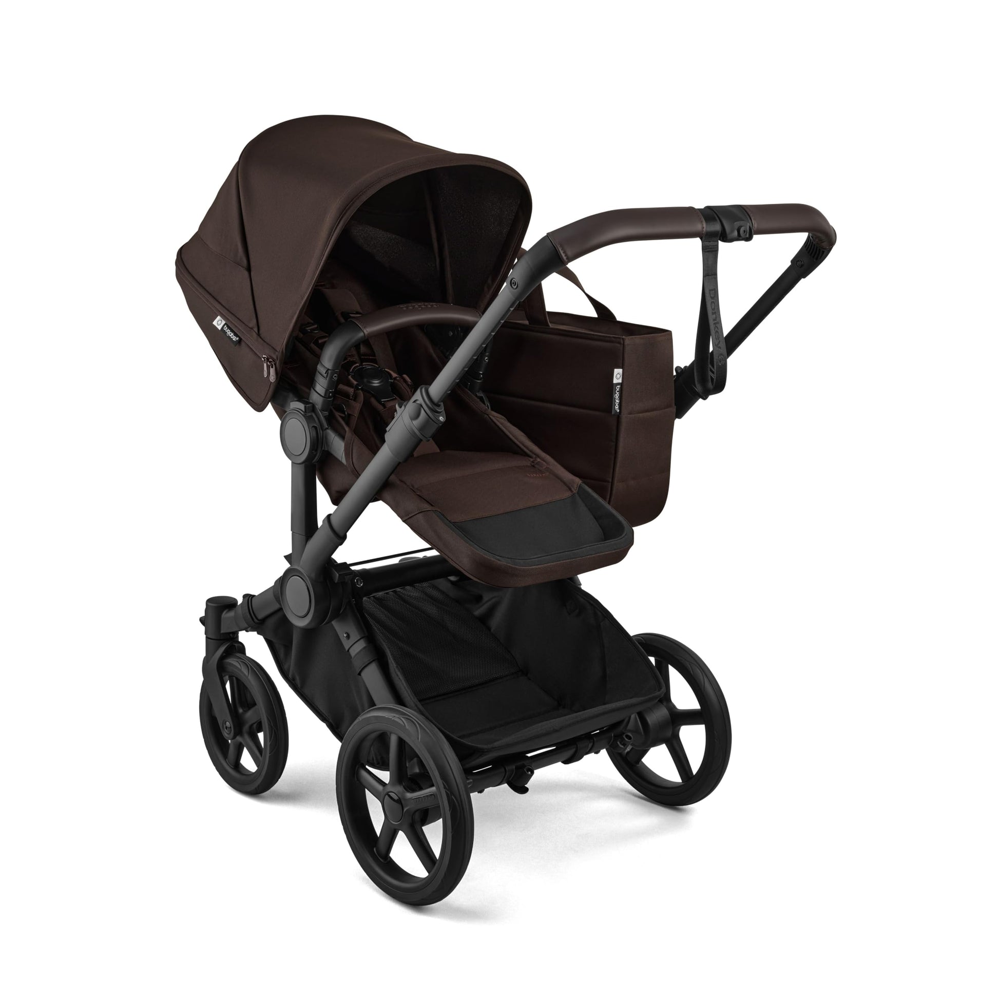 Bugaboo Donkey 6 Cocoa Brown single-to-double all-terrain stroller with adjustable seats for newborn and toddler.