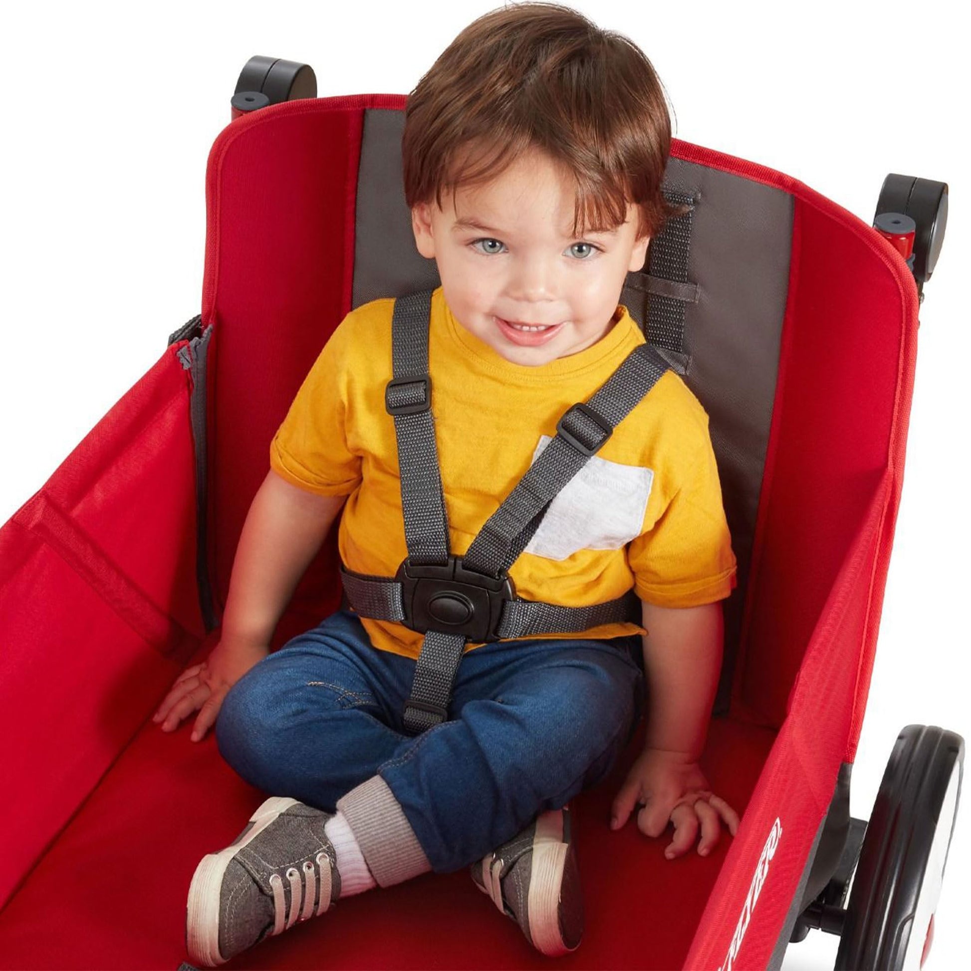Red Radio Flyer wagon for kids with wheels, convertible stroller and rolling cart for toddlers ages 1+ outdoor play and beach trips.