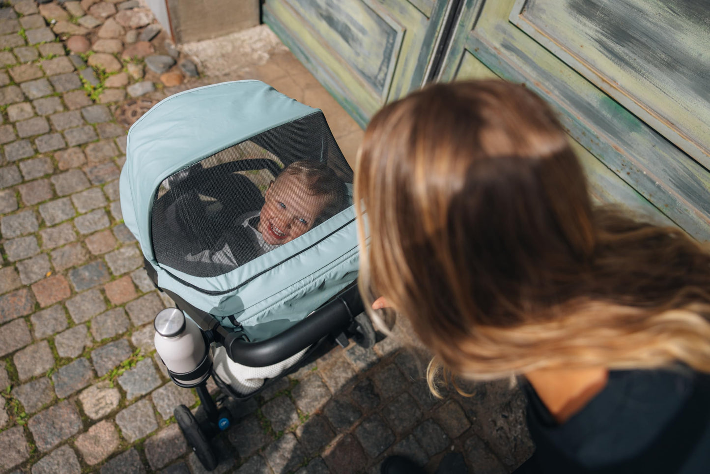 Thule Spring 2 single child stroller with ventilated canopy, adjustable handlebar, lightweight design, and compact fold for easy transport.