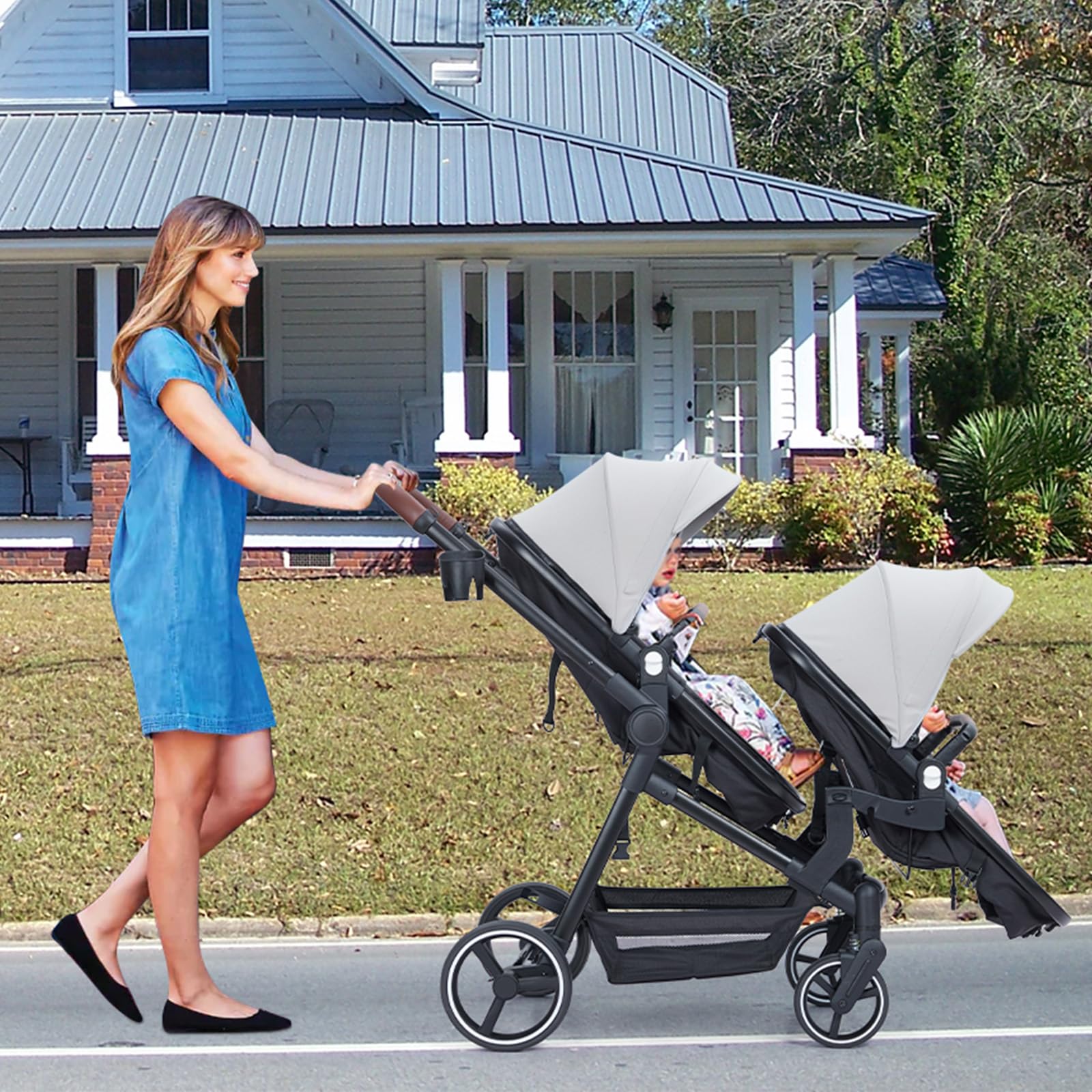 My Store tandem stroller with reversible seats, adjustable canopy, one-hand fold, and large storage basket for twins in black.