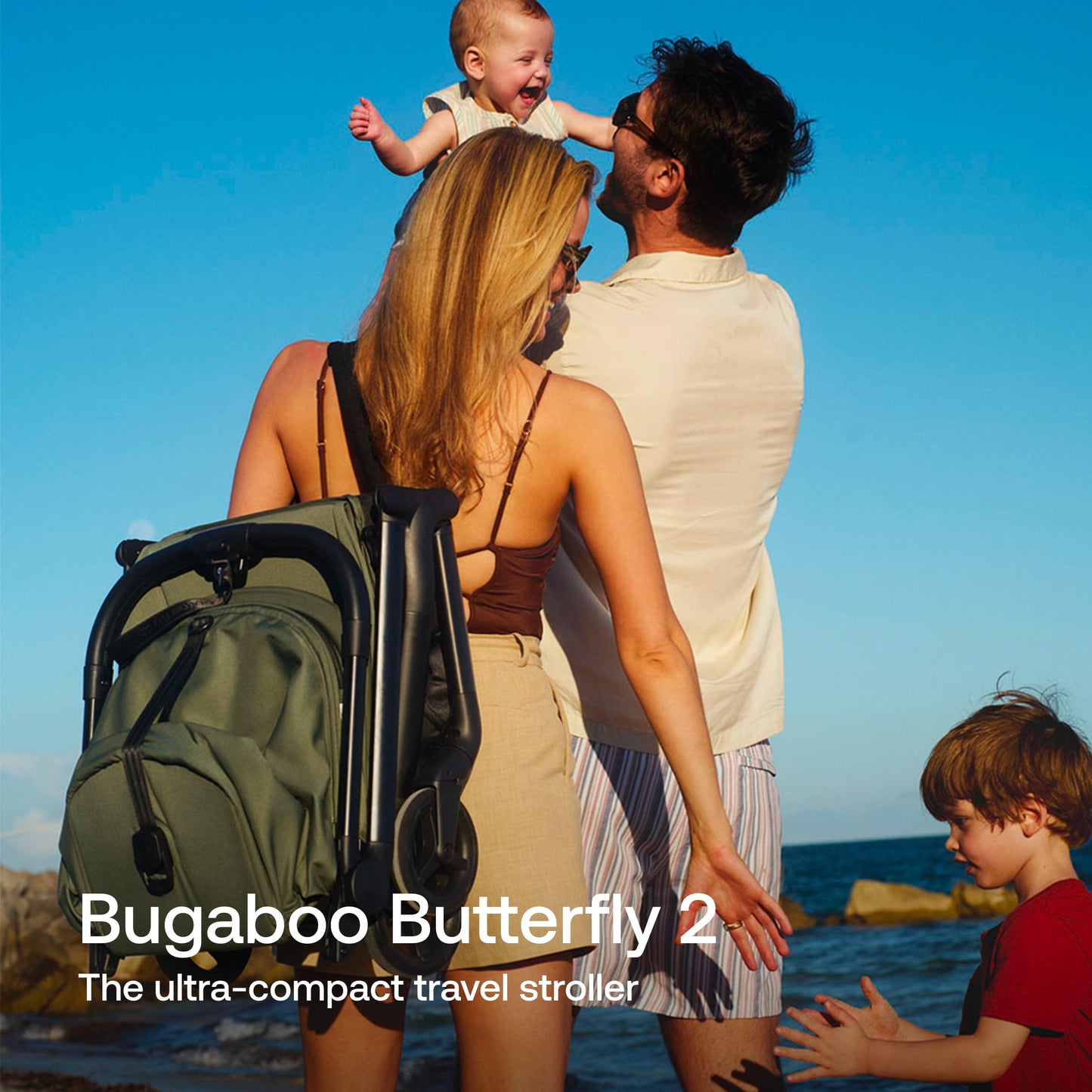 Black Bugaboo Butterfly 2 travel stroller folded compactly, lightweight design, suitable for airplane travel, with sleek black fabric.