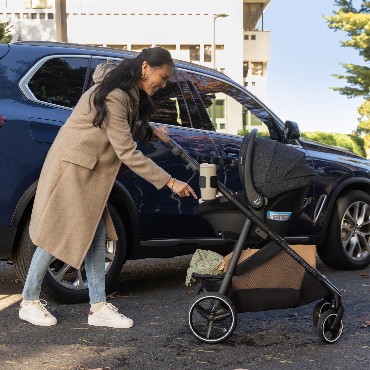 Evenflo Shyft Intuiti Travel System with Revolve180 LiteMax NXT infant car seat in Fossil Gray, lightweight rear-facing for preemies and infants