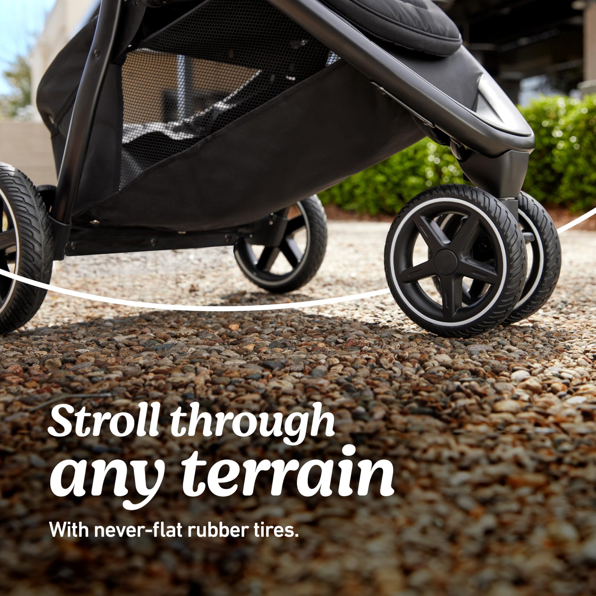 Gray Graco Outpace LX all-terrain 3-wheel baby stroller with rubber tires, one-hand fold, and in-seat suspension for smooth rides.