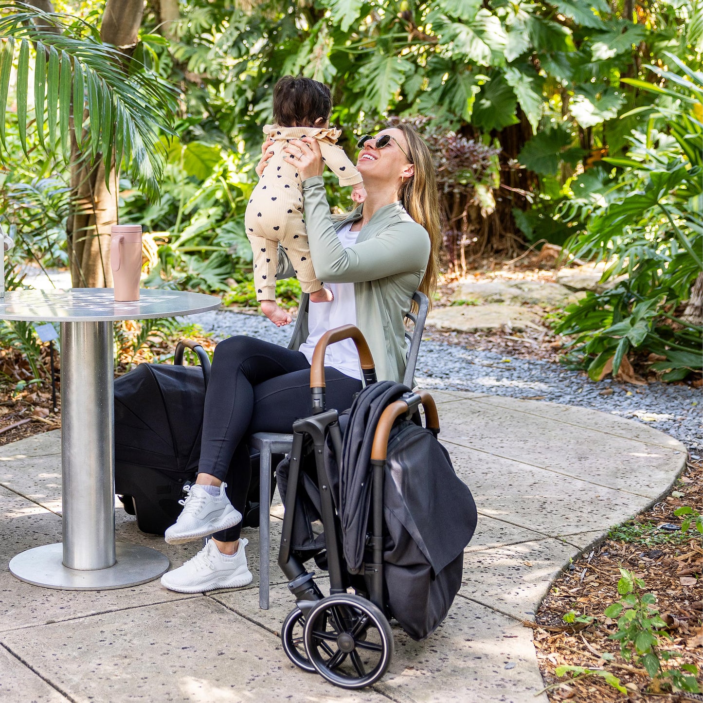 Joie Nutmeg compact stroller in shale color, lightweight design with one-hand fold, suitable for easy travel and everyday use.