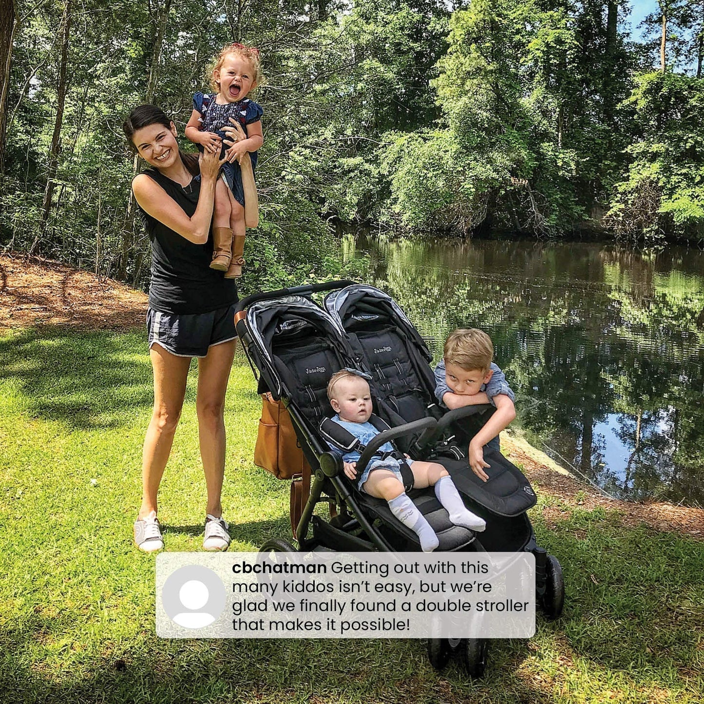 Jeep Destination Ultralight Side-by-Side Double Stroller in Midnight, featuring two seats with safety harnesses and adjustable canopies.